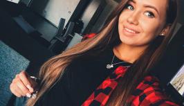 Pretty girl in red shirt on videochat