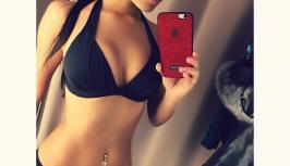 Girl in black sport brassiere is on chat