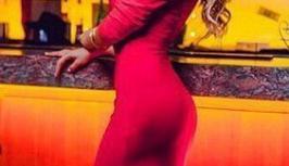 Girl in long pink evening dress looks like sweet lollipop 