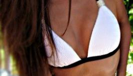 Hot girl in the white swimsuit wait for someone interesting boy on videochat 