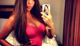 Sexy girl in pink dress on videochat