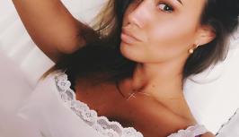 Girl in her bed waiting for someone