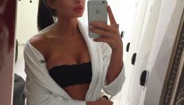Beautiful girl in white bathrobe with big tits
