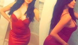 Brunette in sexy red dress is on randomchat